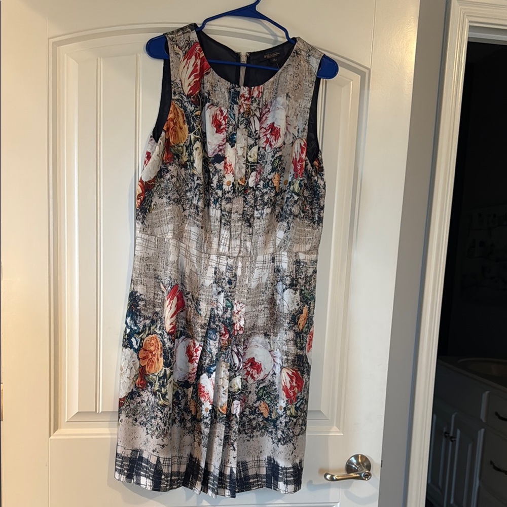 100% silk colors of navy persimmon and taupe Lined